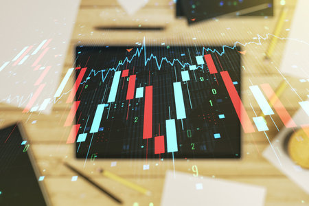 Double exposure of creative abstract global crisis chart with world map hologram and digital tablet on background, top view. Financial crisis and recession conceptの写真素材