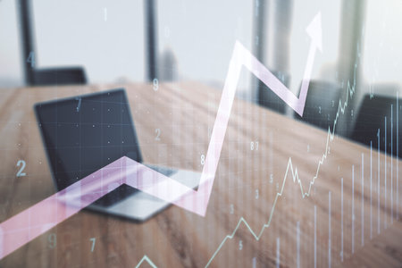Double exposure of abstract creative financial chart with upward arrow on laptop background, research and strategy conceptの写真素材