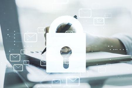 Creative lock sketch with email symbols hologram and hand writing in notepad on background with laptop, protection of personal data concept. Multiexposureの写真素材