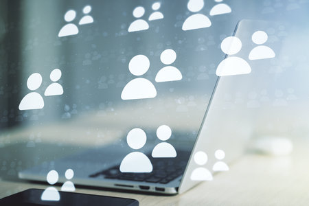 Social network concept with modern laptop on background. Multiexposureの写真素材