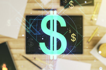 Creative concept of USD symbols illustration and modern digital tablet on background, top view. Trading and currency concept. Multiexposureの写真素材