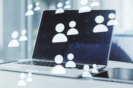 Double exposure of social network icons concept with computer on background. Networking conceptの写真素材