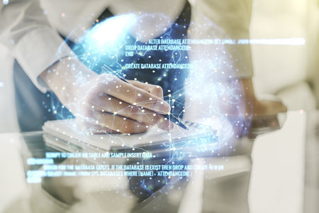 Multi exposure of abstract graphic coding sketch with world map and man hand writing in diary on background, big data and networking conceptの写真素材