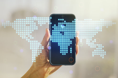 Double exposure of abstract digital world map and hand with cellphone on background, big data and blockchain conceptの写真素材