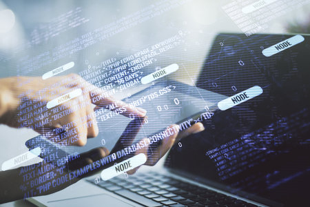 Double exposure of abstract programming language hologram with world map and finger clicks on a digital tablet on background, research and development conceptの写真素材