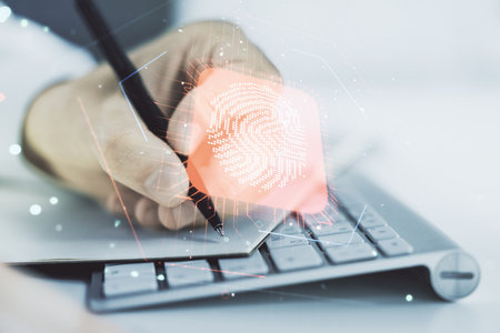 Multi exposure of creative fingerprint hologram with hand writing in notebook on background with laptop, personal biometric data conceptの写真素材