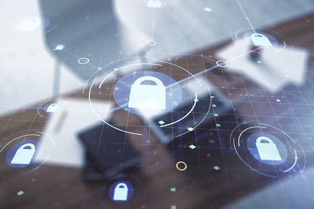Creative light lock illustration with microcircuit and modern desktop with pc on background, cyber security concept. Multiexposureの写真素材