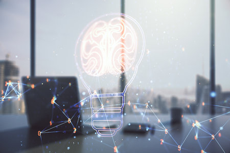 Creative light bulb illustration with human brain and modern desktop with pc on background, future technology concept. Multiexposureの写真素材