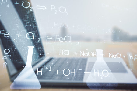 Double exposure of creative chemistry concept on laptop background, research and development conceptの写真素材