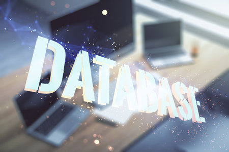 Double exposure of creative Database word hologram and modern desktop with laptop on background, research and development conceptの写真素材