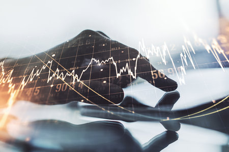 Double exposure of abstract creative financial diagram with finger clicks on a digital tablet on background, banking and accounting conceptの写真素材
