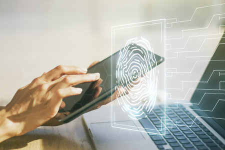 Double exposure of abstract creative fingerprint hologram with finger clicks on a digital tablet on...