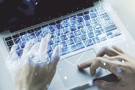 Creative Code word sign and hands typing on laptop on background, international software development concept. Multiexposureの写真素材