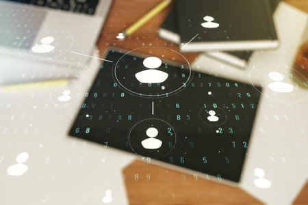 Social network media concept and modern digital tablet on desktop on background, top view. Double exposureの写真素材