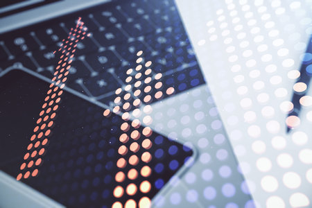 Creative concept of upward arrows illustration on modern laptop background. Breakthrough and progress concept. Multiexposureの写真素材