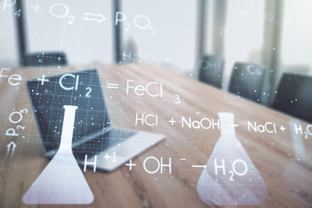 Double exposure of creative chemistry concept on laptop background, research and development conceptの写真素材