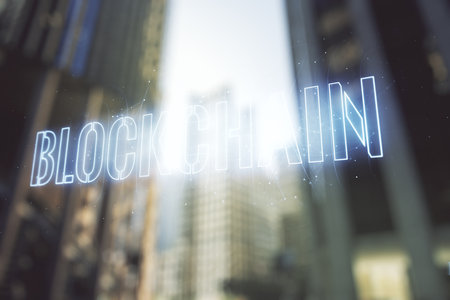 Abstract virtual blockchain technology hologram on office buildings background. digital money transfers and decentralization concept. Multiexposureの写真素材