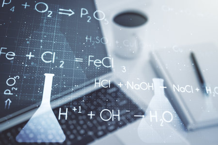 Double exposure of creative chemistry concept on laptop background, research and development conceptの写真素材