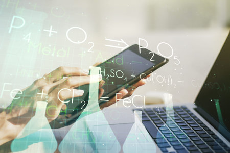Creative chemistry concept with finger clicks on a digital tablet on background. Multiexposure