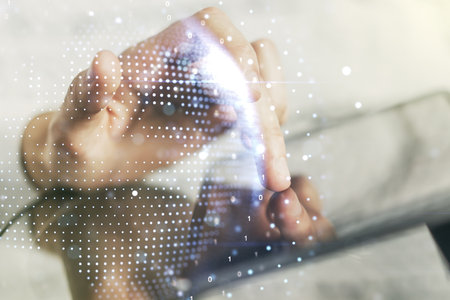 Double exposure of abstract digital world map and finger clicks on a digital tablet on background, big data and blockchain conceptの写真素材