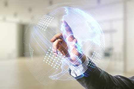 Double exposure of businessman hand working with graphic America map on blurred office background, big data and digital technology conceptの写真素材