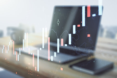 Abstract creative financial graph and modern desktop with pc on background, financial and trading concept. Multiexposureの写真素材