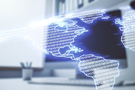 Double exposure of graphic America map and modern desk with computer on background, big data and digital technology conceptの写真素材