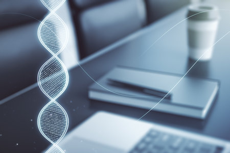 Double exposure of creative DNA hologram on laptop background. Bio Engineering and DNA Research conceptの写真素材