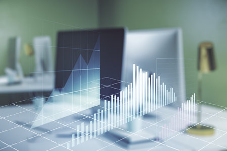 Multi exposure of abstract financial graph on laptop background, financial and trading conceptの写真素材