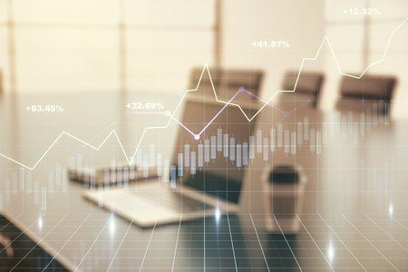 Multi exposure of abstract financial graph on laptop background, financial and trading conceptの写真素材
