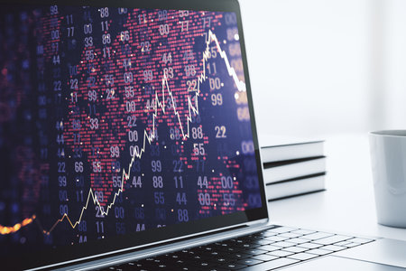 Modern computer monitor with abstract creative financial chart with world map, research and strategy concept. 3D Renderingの写真素材