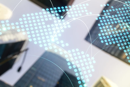 Double exposure of abstract digital world map hologram with connections on modern skyscrapers...