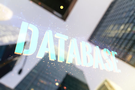 Double exposure of Database word sign on office buildings background, global research and analytics conceptの写真素材