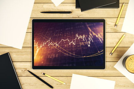 Top view of abstract creative financial graph on modern digital tablet screen, forex and investment concept. 3D Renderingの写真素材