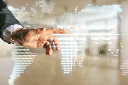 Man hand clicks on abstract creative digital world map on blurred office background, globalization concept. Multiexposureの写真素材