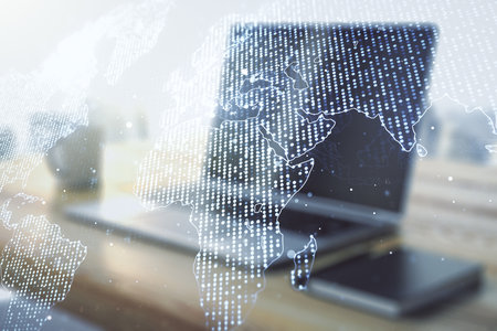 Multi exposure of abstract creative digital world map and modern desktop with computer on background, tourism and traveling conceptの写真素材