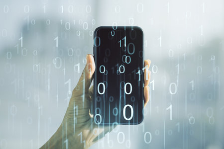 Creative concept of binary code illustration and hand with phone on background. Big data and coding concept. Multiexposureの写真素材