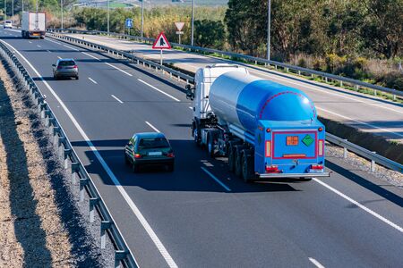 Heavy vehicle driving on the highwayの写真素材