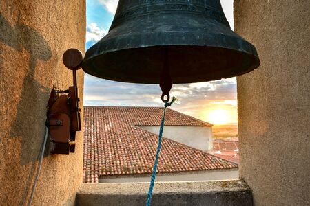 Old bell in a bell towerの写真素材