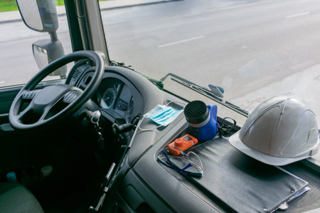 Personal protective equipment in the cabin of a truck that transports dangerous goods, consisting of...