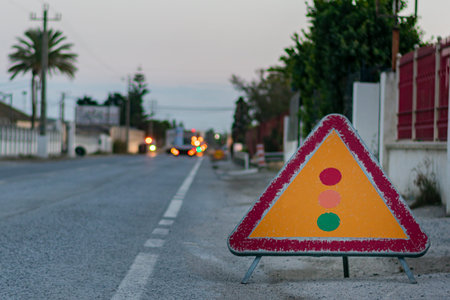 Traffic sign indicating the proximity of a traffic light to regulate the traffic for works on the...
