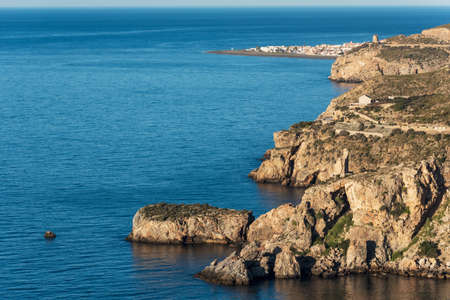 Cliffs with Calahonda beach in the background on the tropical coast of Granadaの写真素材