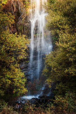 Waterfall with silk effect in the Lanjaron river, Sierra Nevada, Granada.