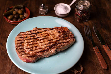 Grilled beef entrecote with flake salt, diner view.の写真素材