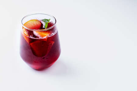 Glass with sangria, with fruits and mint.の写真素材
