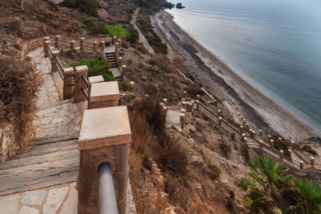 Stairs down to the nudist beach La Joya, in Torrenueva Costa, Granada, long and quite steep stairs until you reach the cove.の写真素材