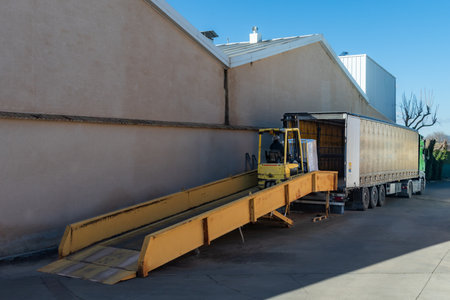 Mobile ramp used by the forklift to put the pallets inside the truck.の写真素材