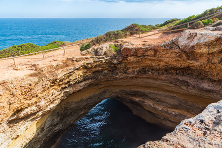 Benagil cave seen from the upper hole of the cave, Algarve.の写真素材