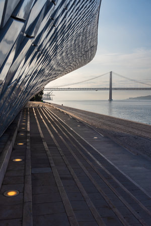 View from the museum of art, architecture and technology of the 25 de Abril bridge in Lisbon.のeditorial素材