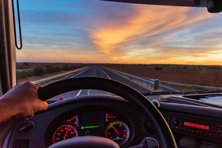 View from inside a truck of an empty highway.の写真素材